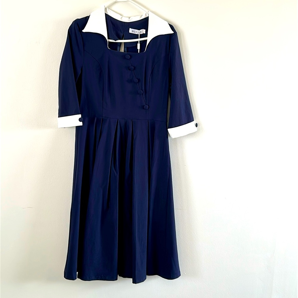 Vintage inspired navy blue dress.